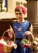 Dagmara Ferkova with baskets of hand-decorated eggs